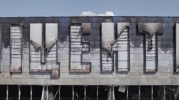 War in Ukraine Destroyed Shopping Center in Bucha alt