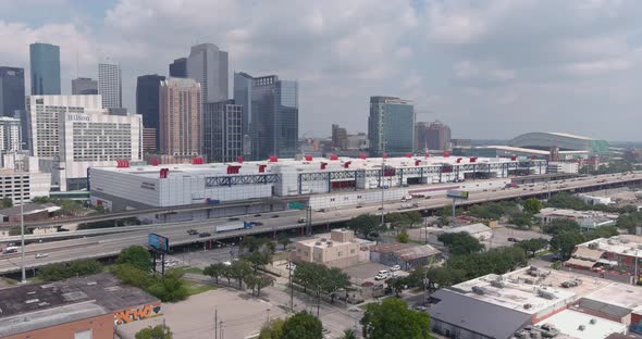 Drone view of downtown Houston skyline and surrounding area. This video was filmed in 6k and down sc alt