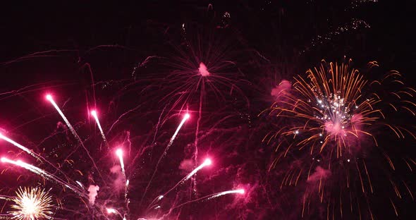 Fireworks show against the background of the night sky alt
