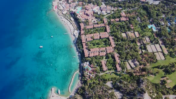 Aerial photography of Fethiye beach - adjacent to a winding road