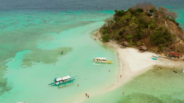 Small Torpic Island with a White Sandy Beach Top View alt