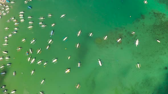 Tourist Boats in a Bay with Blue Water alt