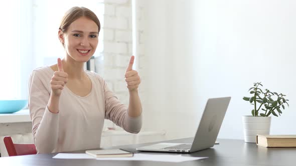 Thumbs Up Gesture by Woman in Loft Office alt