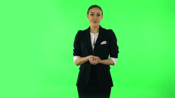 Beautiful Girl Is Reporting and Tells a Lot of Interesting Informations, Green Screen alt