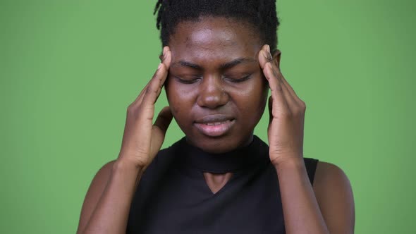 Young Stressed African Businesswoman Having Headache