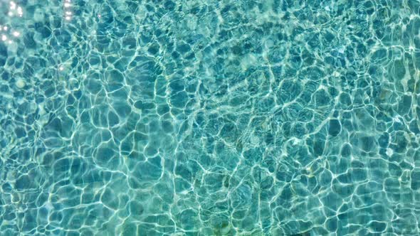 Water Surface Texture Looping Clean Swimming Pool Ripples And Wave Refraction Of Sunlight Top View By Sibstock