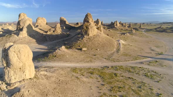 Spires Rising From the Barren and Flat Landscape alt