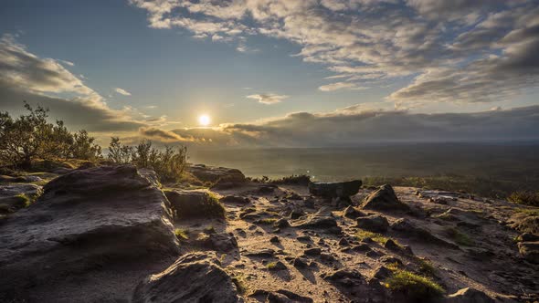 Time lapse of a beautiful place in the mountainouss region of Bohemian Switzerland at sunset.  alt