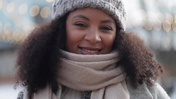 Pretty African American Woman is Posing and Smiling for Camera While Standing in Outdoors Spbi alt