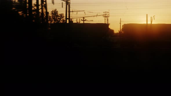 View From a Moving Train at Dawn alt