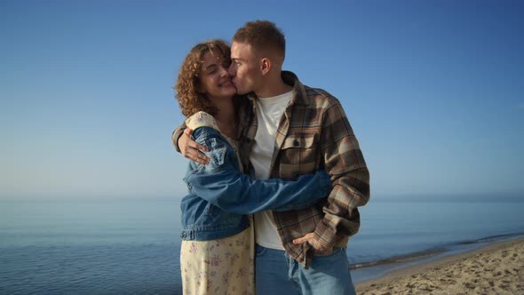 Cheerful Couple Dating on Beautiful Sea Coast alt