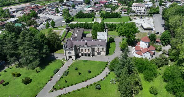 Zugdidi, Georgia - May 30 2022: Aerial view of Dadiani Palace in the center of Zugdidi city alt
