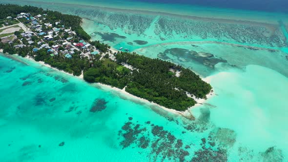 Tropical overhead island view of a white sand paradise beach and turquoise sea background in colourf alt