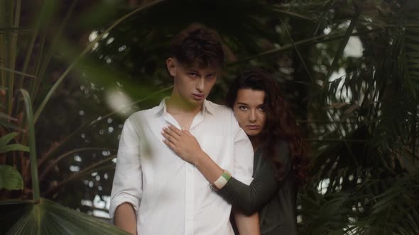 Romantic Couple in Love Standing in the Tropical Jungle alt