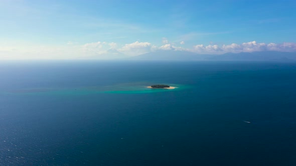 Island with a Beach, Top View. Rosa Island. Seascape with a Small Island. alt
