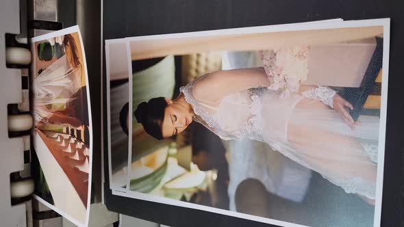 Chemical Printing of Photos From the Wedding in the Photo Laboratory alt