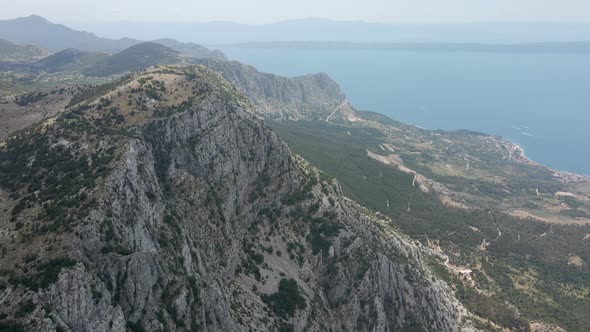 High Rocky Mountains Against the Backdrop of the Extremely Beautiful Sea Coast of Croatia