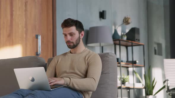 A successful man reacts emotionally to the news alt