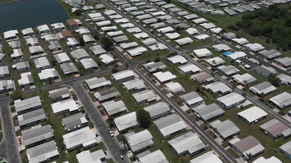 Blocks of double wide mobile homes in South Florida, USA as visible from a drone alt