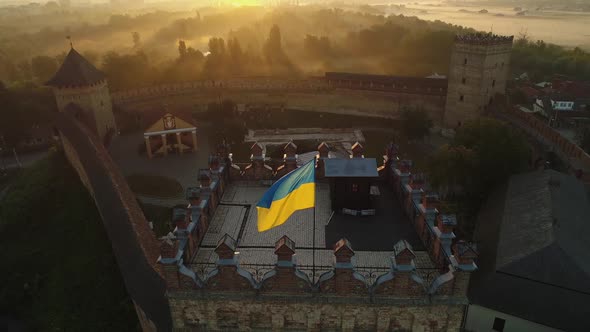 Aerial View of the Main Tower of Lutsk Castle with the Flag of Ukraine