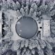 Aerial Top-Down Shot of Snowy Vacation Home with Pine Trees Surrounding It - VideoHive Item for Sale