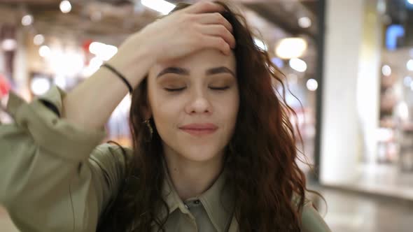 Girl Looks at the Camera and Smiles alt