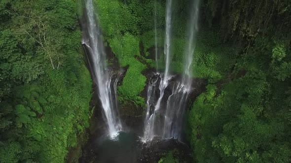 Aerial View of Waterfall in Green Rainforest