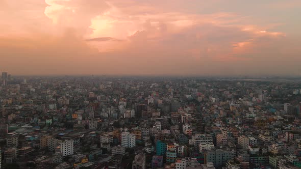 Aerial of a gorgeous pink sky over the Dhaka metropolitan region-Bangladesh alt