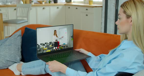 Back View of Student Learning Education Online at Home alt