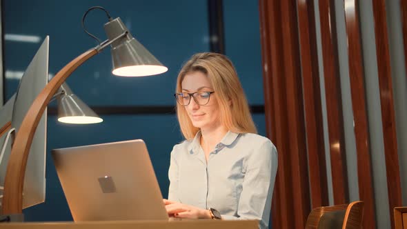 Focused Barrister Reading Corporate Financial Audit Report Document. Lawyer Analyzing Charts. alt