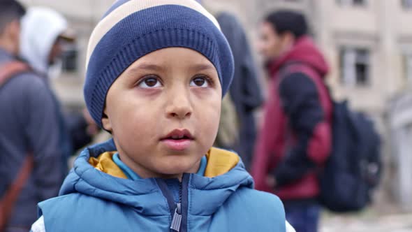 Adorable Refugee Boy alt