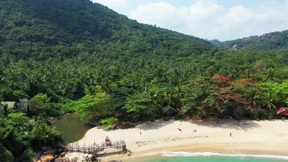 River and a wooden deck on the Haad Than Sadet Beach, Koh Phangan, Thailand . Natural reserve , trop alt