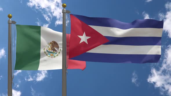 Mexico Flag Vs Cuba Flag On Flagpole alt