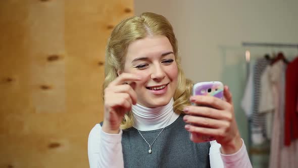 Drunk Woman Looking At Photos Of Her ExBoyfriend On Phone By Chipleader