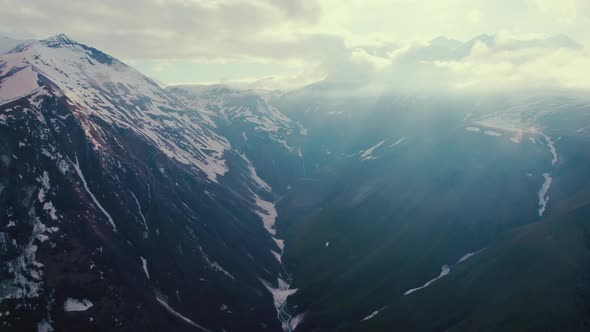 Glorious Aerial View of Snowy Caucasus Mountains in Georgia alt