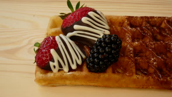 Sweet Waffle with Strawberries Chocolate and Caramel
