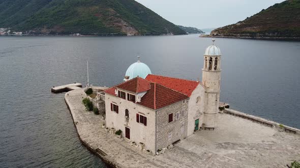 Drone View of Small Ancient Church on Island