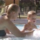 Mother and her son in the swimming pool - VideoHive Item for Sale