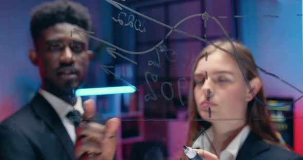 Businesspeople Working Together Near Glass Board Over Growth Strategy of Company or Start Up Project alt