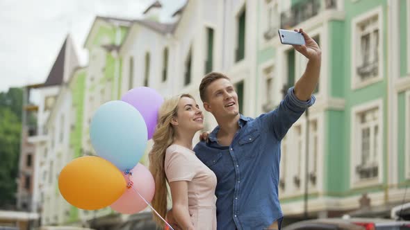 Young Female and Male in Love Hugging and Taking Selfie, Romantic Memories alt