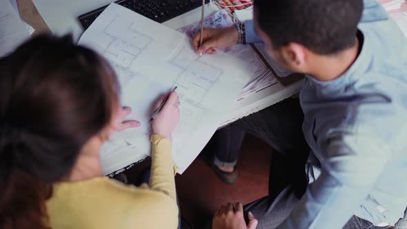 People working in a creative studio alt