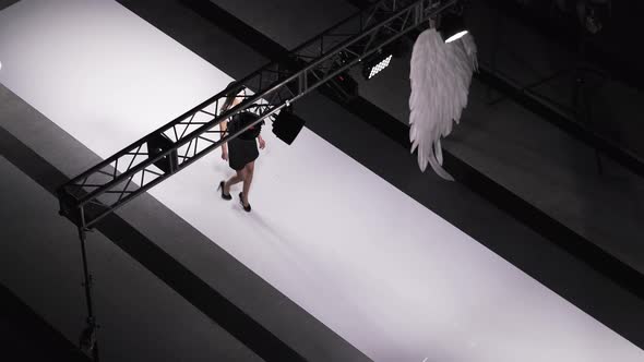 Fashion Week Show of Beauty Models. Defile on Catwalk. Catwalk Beautiful Girls. alt