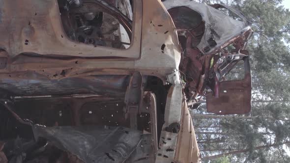 Vertical Video of a Dump of Destroyed Cars During the War in Ukraine alt