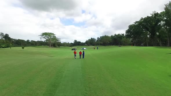 Aerial of Golfers walking in Sta. Elena Golf and Country Club, Laguna, Philippines alt