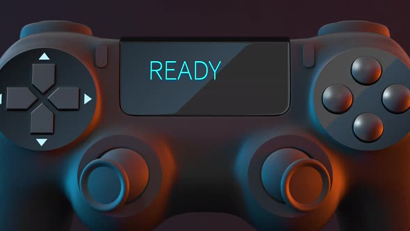 Game pad with "READY GO" on the screen . alt