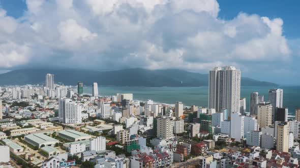 A hyperlapse over the city by ocean in Danang, Vietnam alt