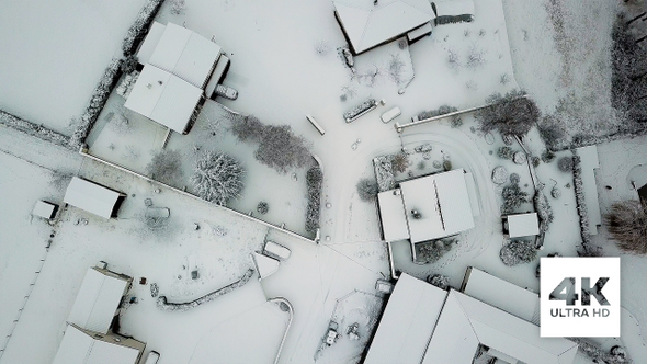 Aerial High Angle View Of Snowy French Village