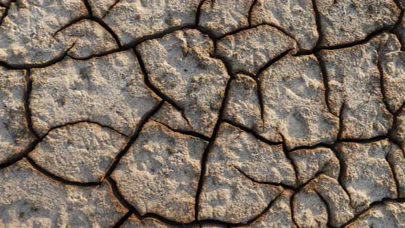 Closeup Shot of Cracked Soil Ground of Dried Lake or River