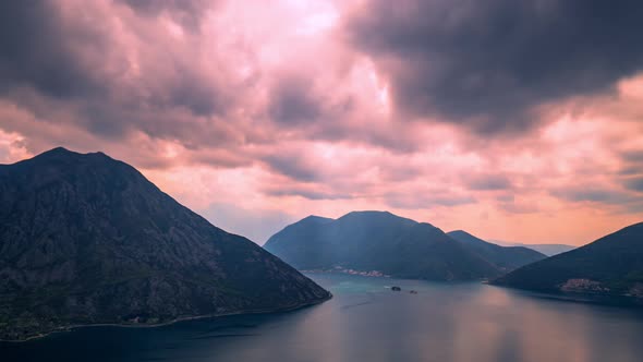 The Movement of Rain Clouds Over the Mountains in Montenegro at Sunset alt