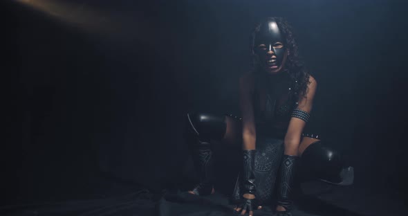 Cat Woman Cosplay Beautiful Black Woman Is Posing in the Smoke Squatting alt